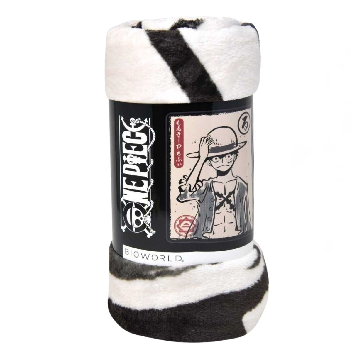 Close-up view of the rolled-up One Piece fleece throw blanket showing its soft black and white texture and the printed Bioworld packaging band.
