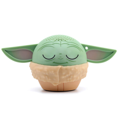 Front view of the Bitty Boomers Star Wars mini Bluetooth speaker featuring Grogu with his eyes closed, big green ears, and a textured tan robe.