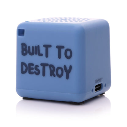 Angled back-right view of the blue Stitch Bluetooth speaker showing the phrase 'BUILT TO DESTROY' written in black font.
