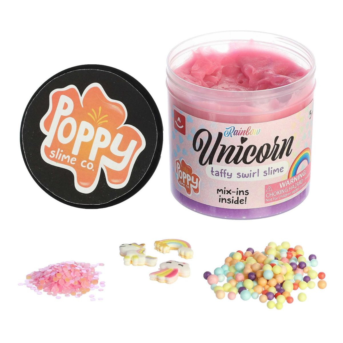 The clear jar of Unicorn Taffy Swirl Slime shown alongside three separate packets of colorful mix-ins and charms.