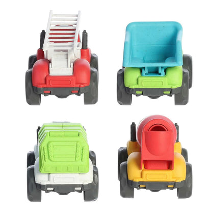 Back view of the four toy trucks showing the cement mixer drum, the back of the garbage truck, the dump truck bed, and the fire truck ladder.