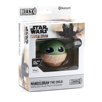 Front view of the Grogu mini Bluetooth speaker inside its official Star Wars The Mandalorian clear display packaging.
