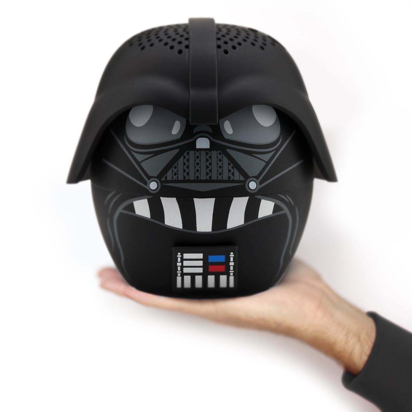A person holding the supersized 8-inch Darth Vader Bluetooth speaker in one hand, demonstrating its large scale.