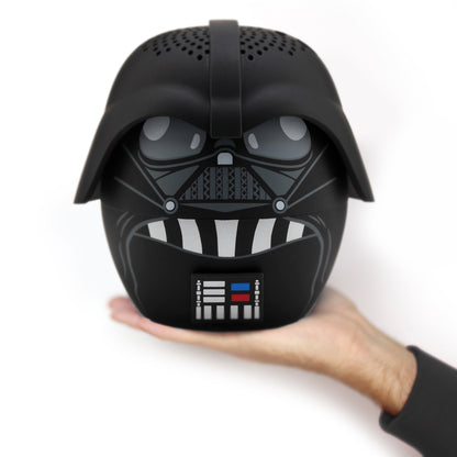 A person holding the supersized 8-inch Darth Vader Bluetooth speaker in one hand, demonstrating its large scale.