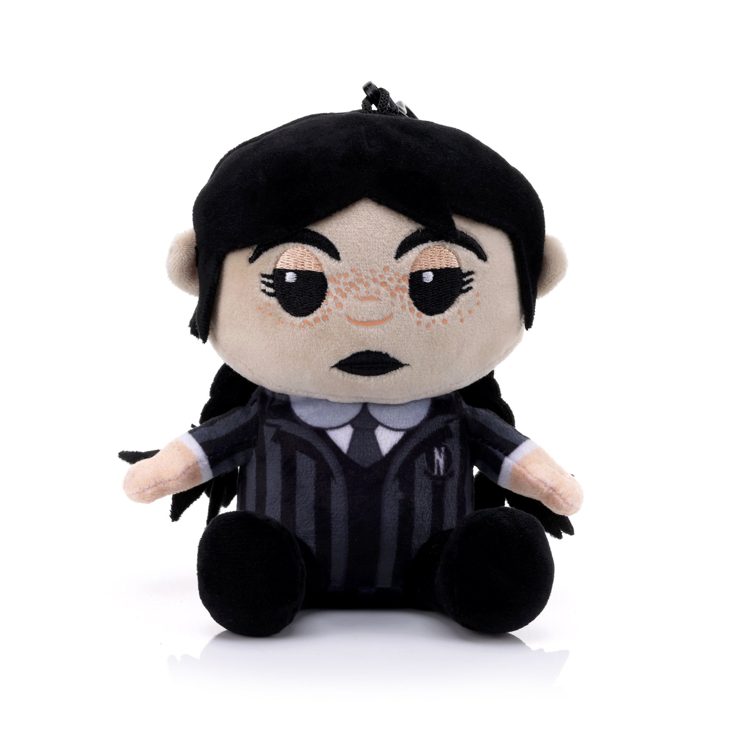 Front view of the Bitty Boomers Wednesday Addams plush Bluetooth speaker featuring her signature braids, freckles, and black and grey striped Nevermore Academy uniform.
