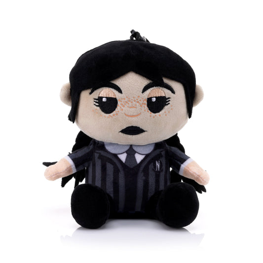 Front view of the Bitty Boomers Wednesday Addams plush Bluetooth speaker featuring her signature braids, freckles, and black and grey striped Nevermore Academy uniform.