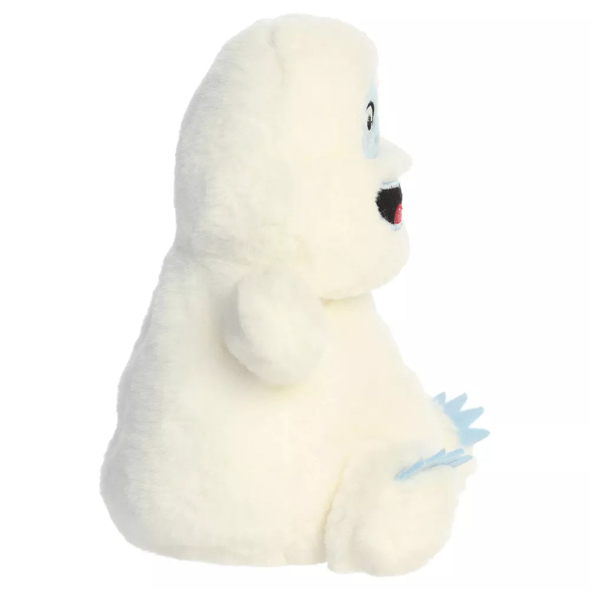 Side profile view of Aurora Bumble the Abominable Snow Monster plush showing round seated shape.