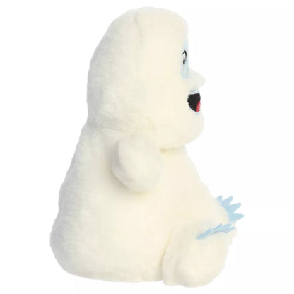 Side profile view of Aurora Bumble the Abominable Snow Monster plush showing round seated shape.