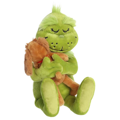 Aurora Dr. Seuss Grinch and Max Holiday Hugs 9-inch green stuffed animal plush hugging dog Max.