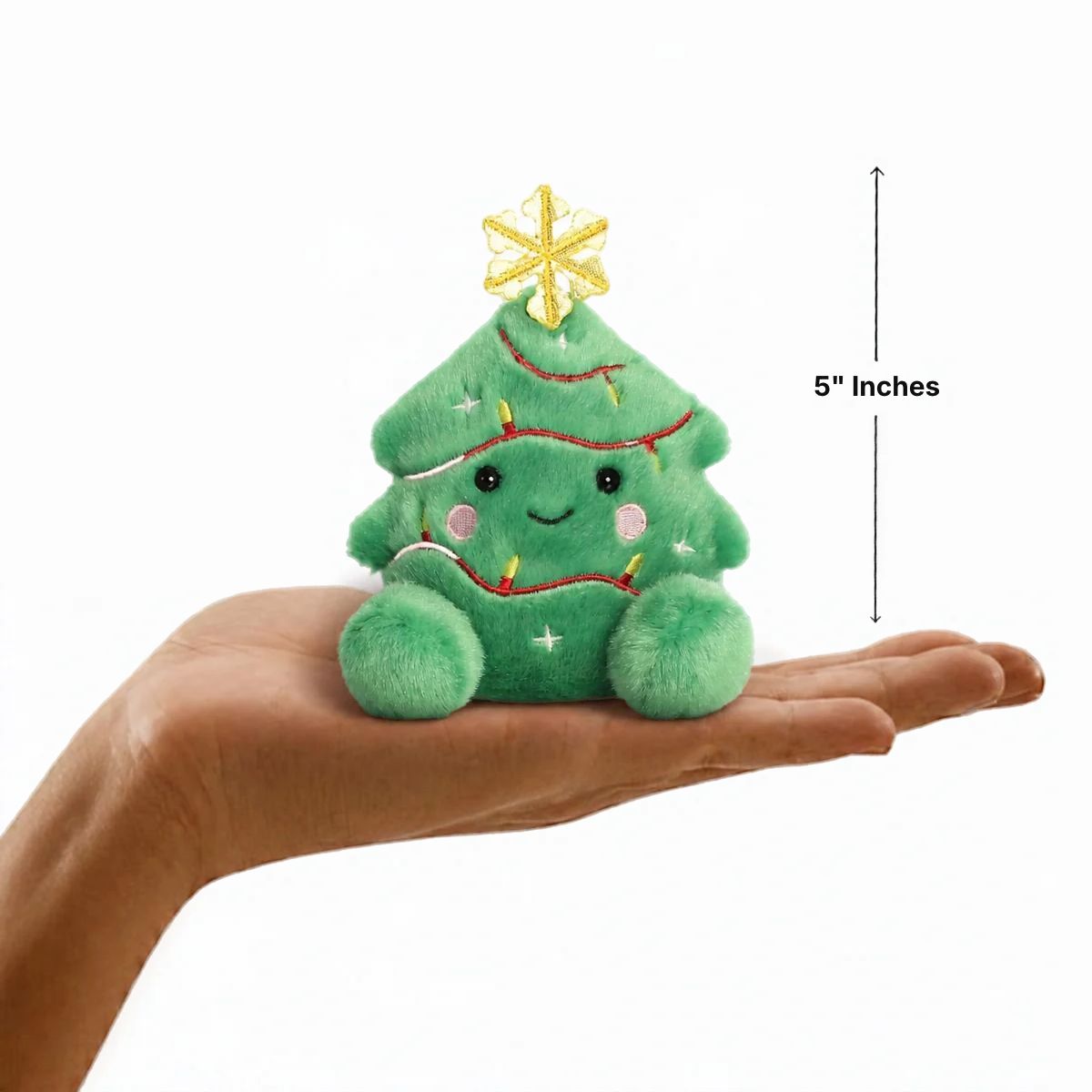 Aurora Palm Pals Balsam Christmas Tree plush resting in a palm with 5-inch vertical height scale measurement bar.