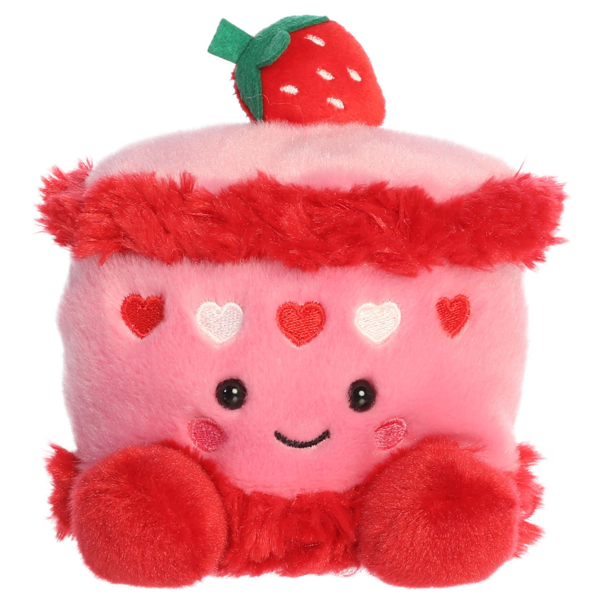 Aurora Palm Pals Crème Strawberry Cake 5-inch pink stuffed animal plush featuring a red strawberry topper, red frosting trim, and embroidered hearts.