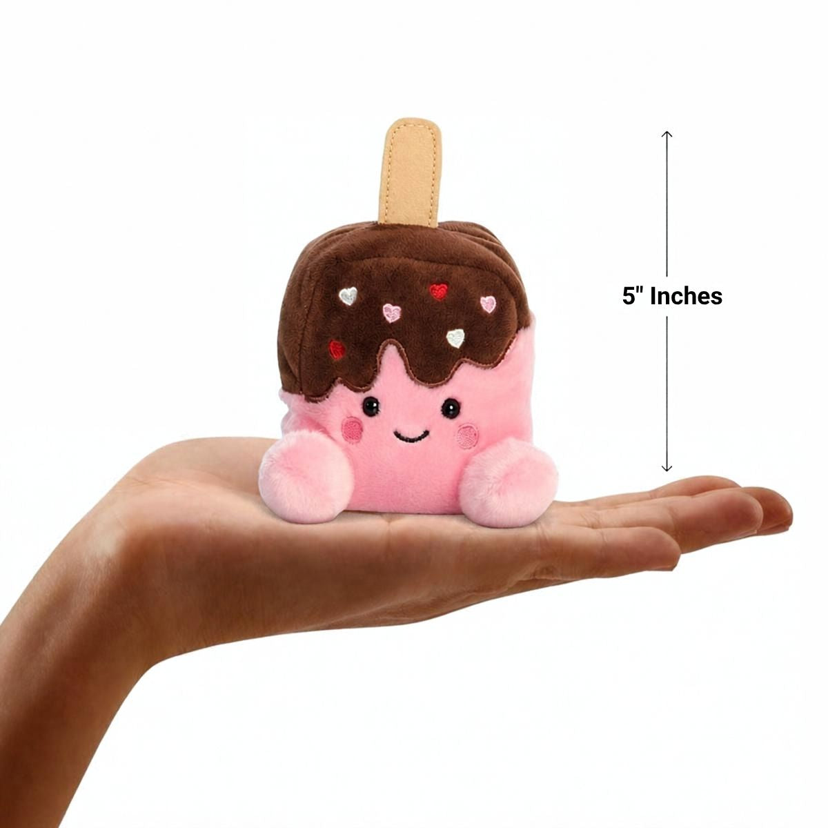 Aurora Palm Pals 5-inch Dulce Heart Ice Cream plush resting in the palm of an open hand.