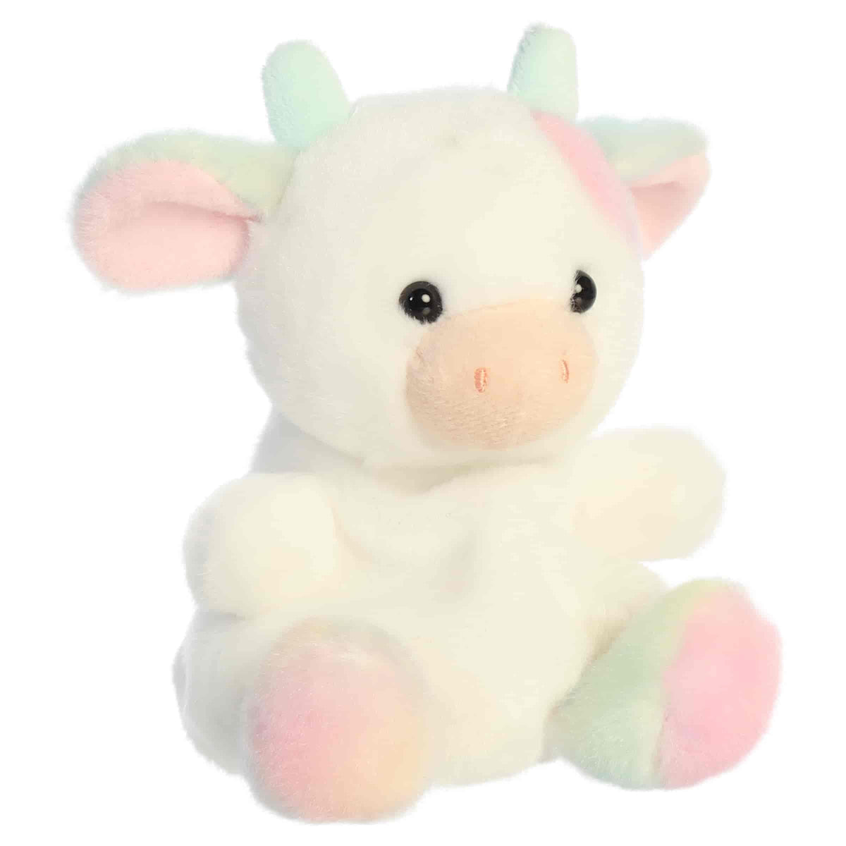 Front three-quarter view of Aurora Palm Pals Georgia Rainbow Cow 5-inch plush with pastel rainbow spots and blush muzzle.