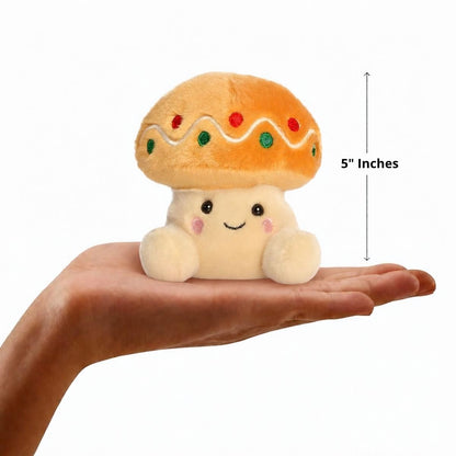 Aurora Palm Pals 5-inch Ginger Cookie Mushroom plush resting in an open hand with height measurement graphic.
