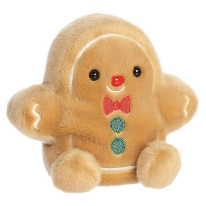 Aurora Palm Pals Gio Gingerbread Man 5-inch plush stuffed animal toy with red bow tie and green buttons.