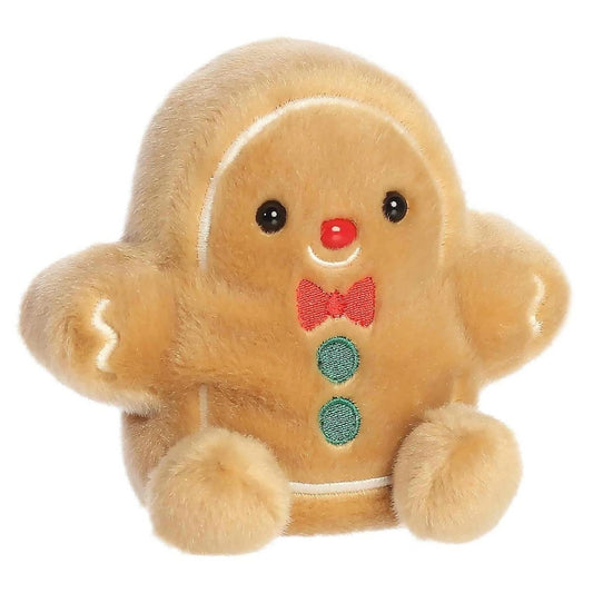 Aurora Palm Pals Gio Gingerbread Man 5-inch plush stuffed animal toy with red bow tie and green buttons.