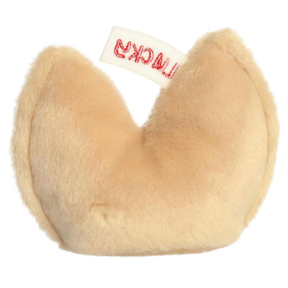 Back view of Aurora Palm Pals Lucky Fortune Cookie plush showing curved golden-brown back and top fortune slip.