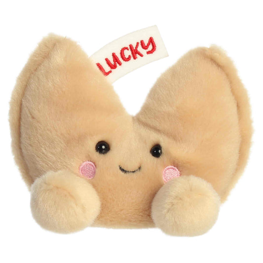Direct front view of Aurora Palm Pals Lucky Fortune Cookie plush showing smiling face, rosy cheeks, and cream feet.
