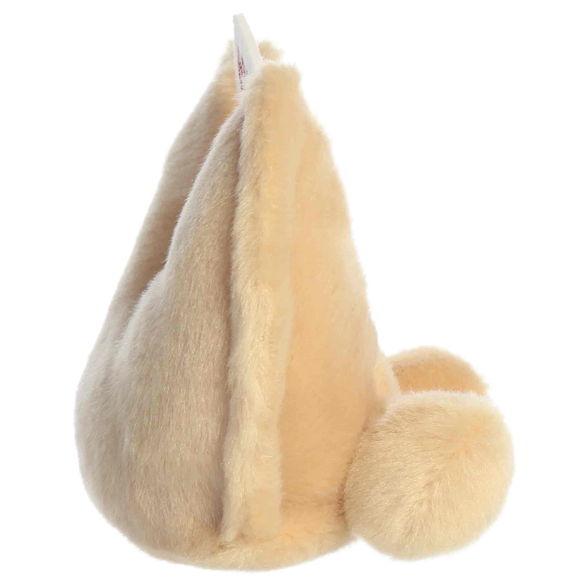 Side profile view of Aurora Palm Pals Lucky Fortune Cookie plush highlighting folded cookie crease and plush foot.   