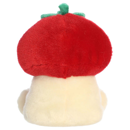 Back view of Aurora Palm Pals Lucy Strawberry Mushroom plush showing solid red cap and cream base.