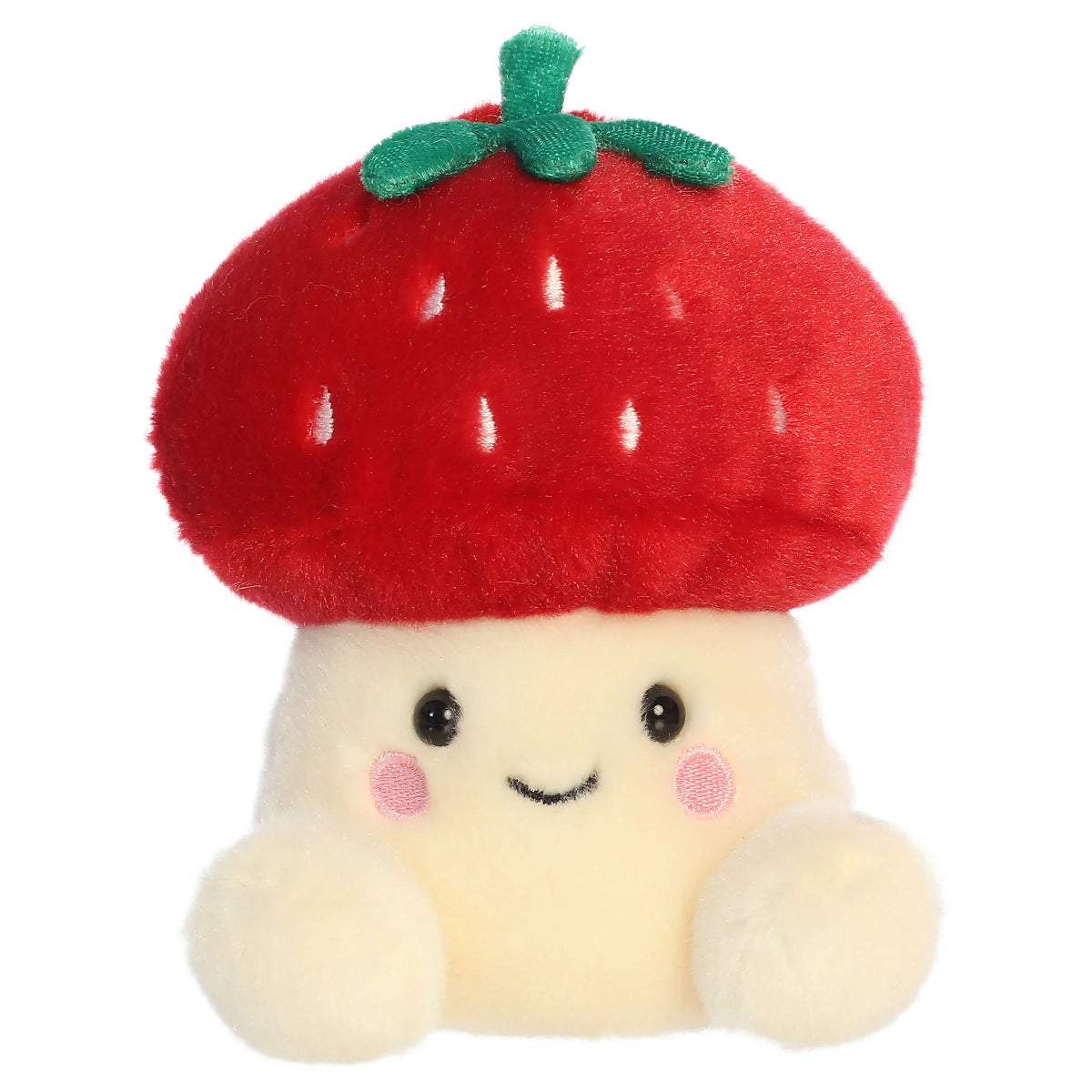 Head-on front view of Aurora Palm Pals Lucy Strawberry Mushroom plush showing stitched smile and rosy cheeks.