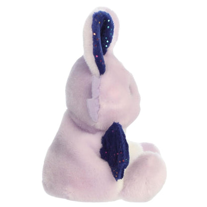 Side profile thumbnail of Nora Night Beast stuffed plush displaying her midnight blue wing and sitting pose.
