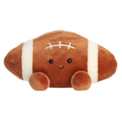 Top-down view of Tackle Football plush highlighting detailed white stitched laces