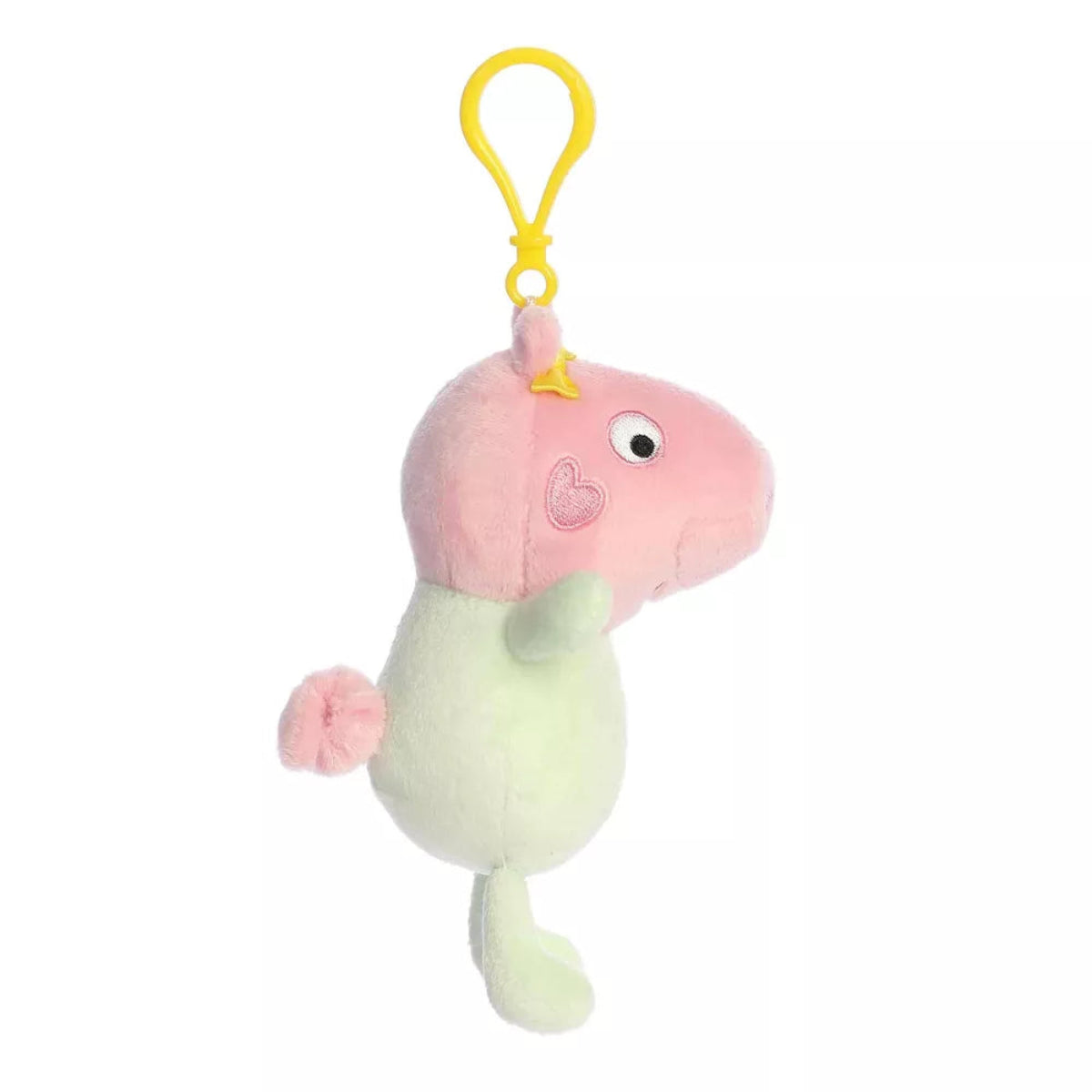 Side profile view of Aurora Palm Pals Baby Evie clip-on plush showing snout profile, little tail, and hanging clip.