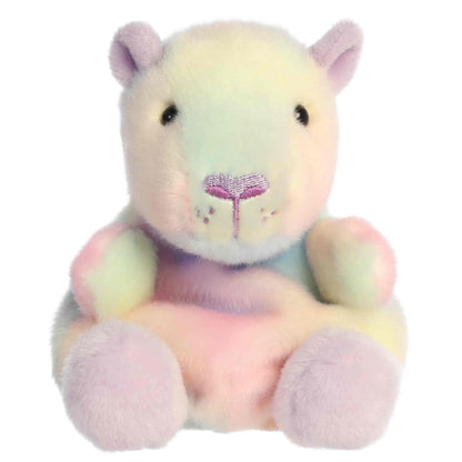 Head-on front seated view of Aurora Palm Pals Seb Sorbet Capybara plush showing heart nose, stitched muzzle, and lilac feet.