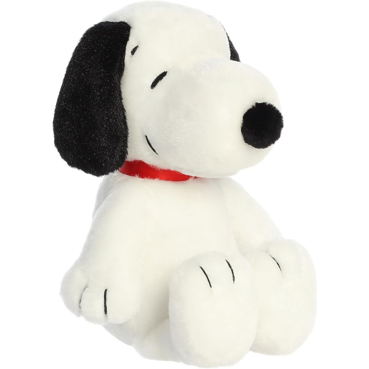 Angled front view of the 16-inch Aurora Peanuts Floppy Snoopy plush sitting upright with his red collar.