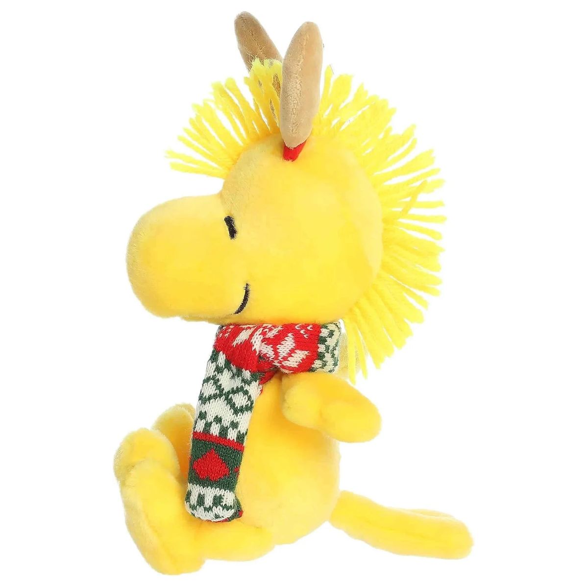 Left side profile view of Aurora Peanuts Reindeer Woodstock plush showing yellow head crest and seated posture.