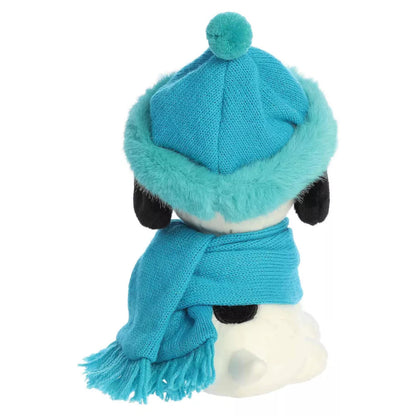 Back view of Aurora Peanuts Snoopy plush showing teal pom-pom hat, draped scarf tails, and black ear tips.