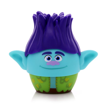 Front view of the Bitty Boomers DreamWorks Trolls Branch mini Bluetooth speaker featuring his signature wild purple hair, blue face, big ears, and green patchwork vest.