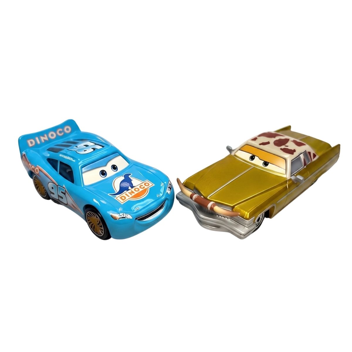 Loose view of 1:55 scale die-cast Bling Bling Lightning McQueen in blue with gold rims and gold Tex Dinoco.