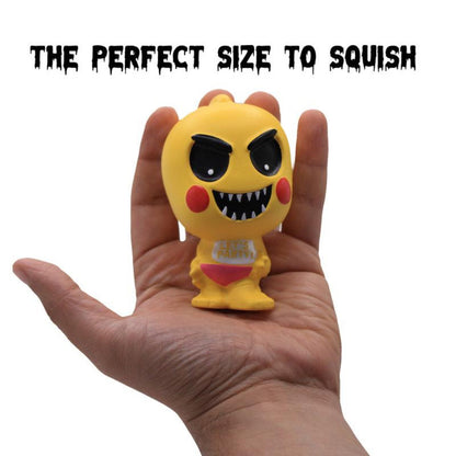 Hand holding a 3.5-inch Chica slow-rise foam SquishMe figure.
