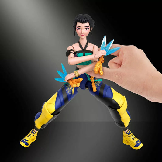 Hand posing Zoey 6-inch action figure holding dual Spirit Blades in a wide stance.