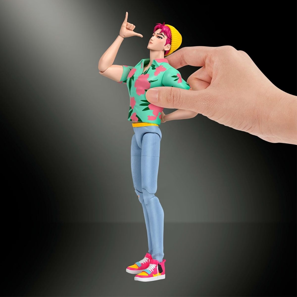 Hand posing Abby 6-inch action figure making a shaka hand sign in his Soda Pop outfit.