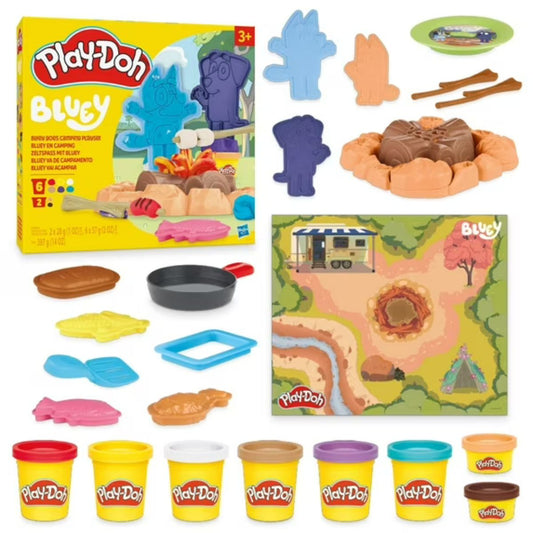 Play-Doh Bluey Goes Camping Playset packaging box next to campfire flame tool, character stampers, playmat, cooking accessories, and 8 compound cans.
