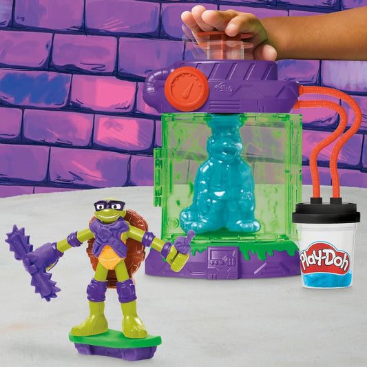 Thumbnail view of green Play-Doh ooze extruding through the translucent Mutation Station chamber with Donatello figure.