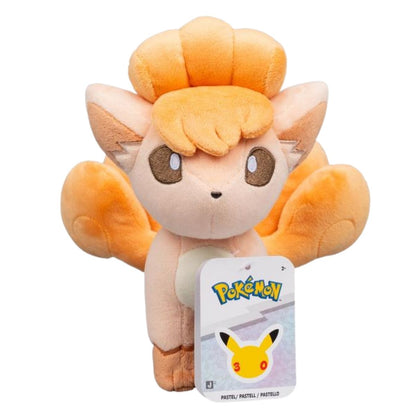 Pastel Vulpix 8-inch plush showing attached official Pokemon 30th Anniversary product tag.