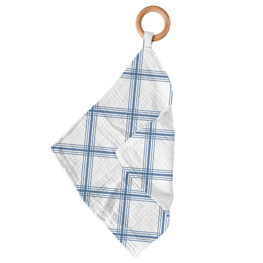 Newcastle Classics Blue Plaid cotton muslin blankie teether hanging from its smooth natural wood ring.