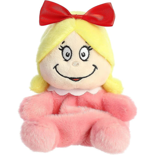 Front view thumbnail of the cute Cindy-Lou Who plush sitting straight, highlighting her large embroidered eyes, wide smile, and pink plush arms and legs.