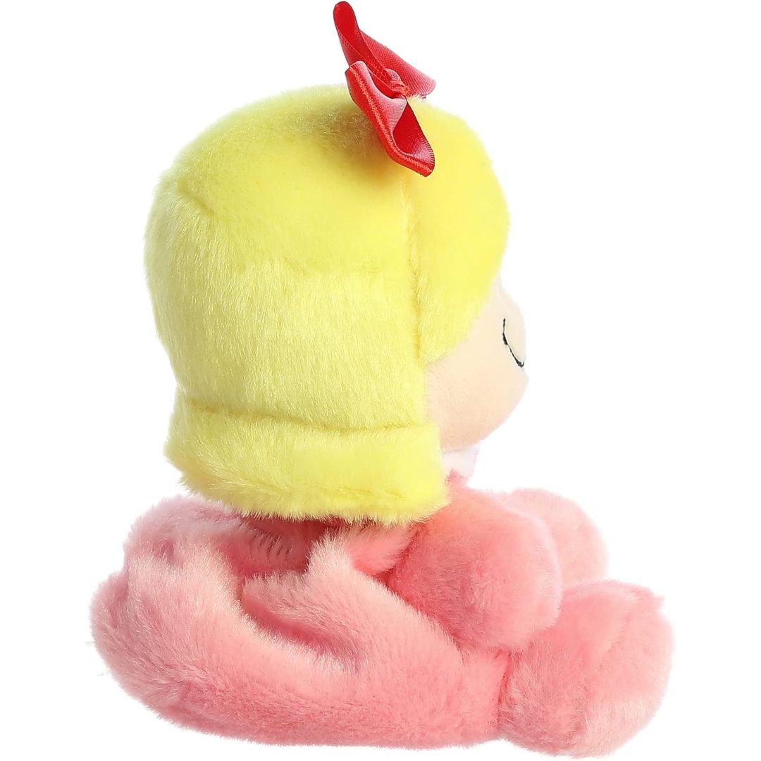 Side profile view thumbnail of the mini Dr. Seuss plush showcasing her rounded yellow hair profile, the red bow on top, and her seated posture.