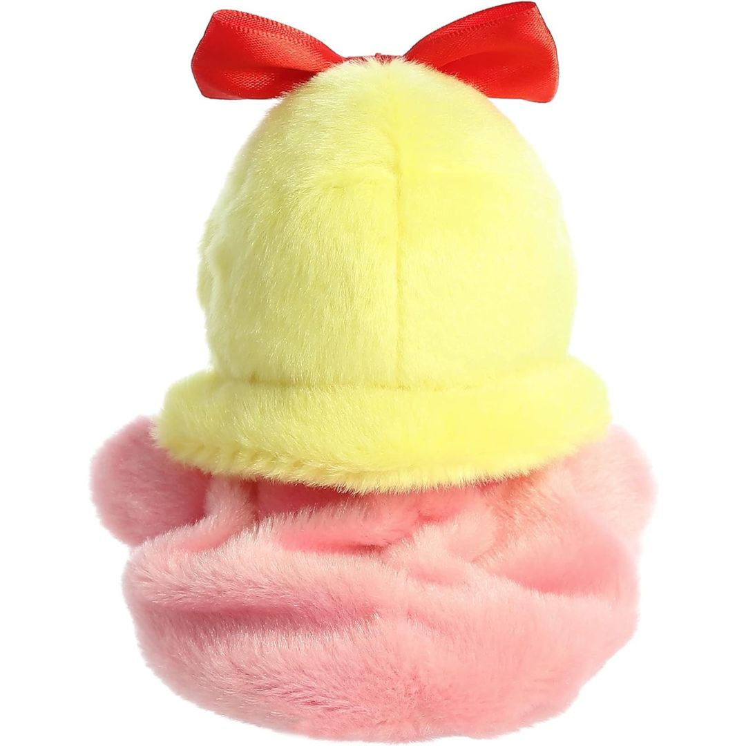 Rear view thumbnail of the Aurora Cindy-Lou Who stuffed toy displaying her smooth pink dress back and the back of her blonde hair.