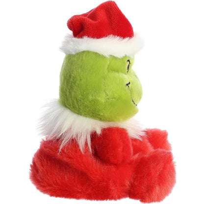 Side profile view thumbnail of the mini Grinch plush showcasing his rounded head profile, plush red outfit, and the white trim of his tipped Santa hat.