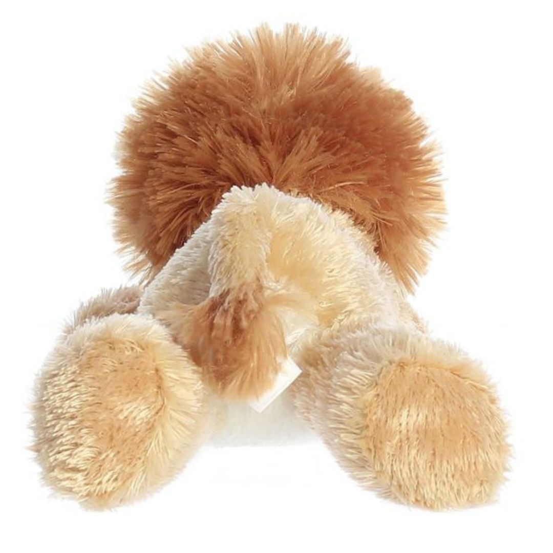 Rear view of the lion plush showing its golden back, fluffy mane from behind, outstretched hind legs, and a small tail.