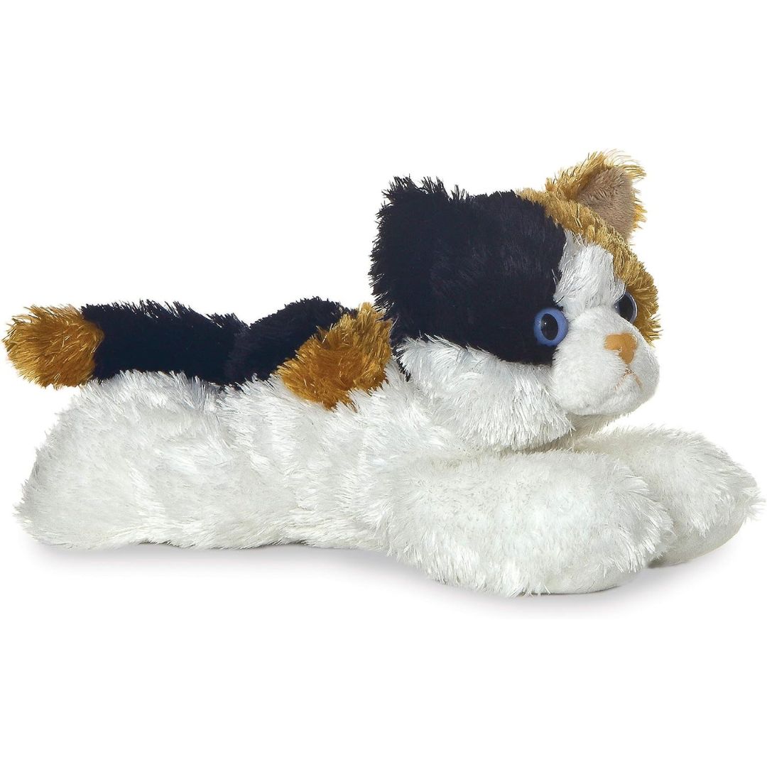 Angled side view of the Aurora Mini Flopsie Esmeralda Calico Cat 8-inch plush resting on its belly, featuring white, black, and orange patched fur.