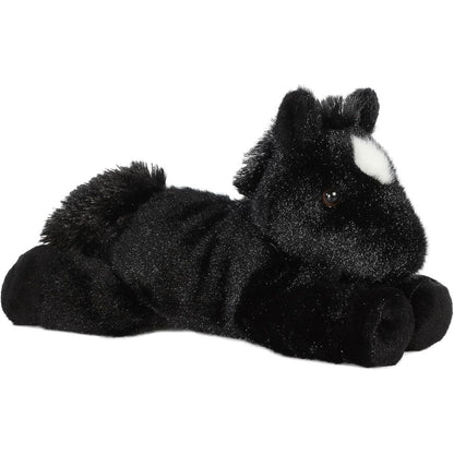 Angled side view of the Aurora Mini Flopsie Beau Black Stallion 8-inch plush resting on its belly, featuring solid pitch-black fur and a white forehead star.