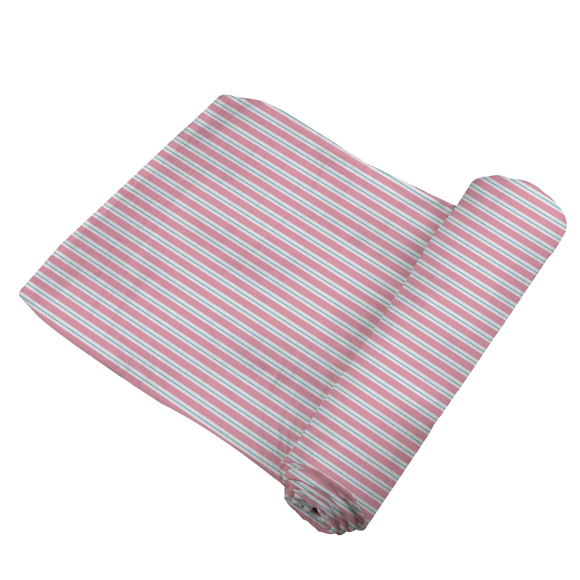 A partially unrolled bamboo muslin swaddle featuring a classic pink and white pinstripe pattern.