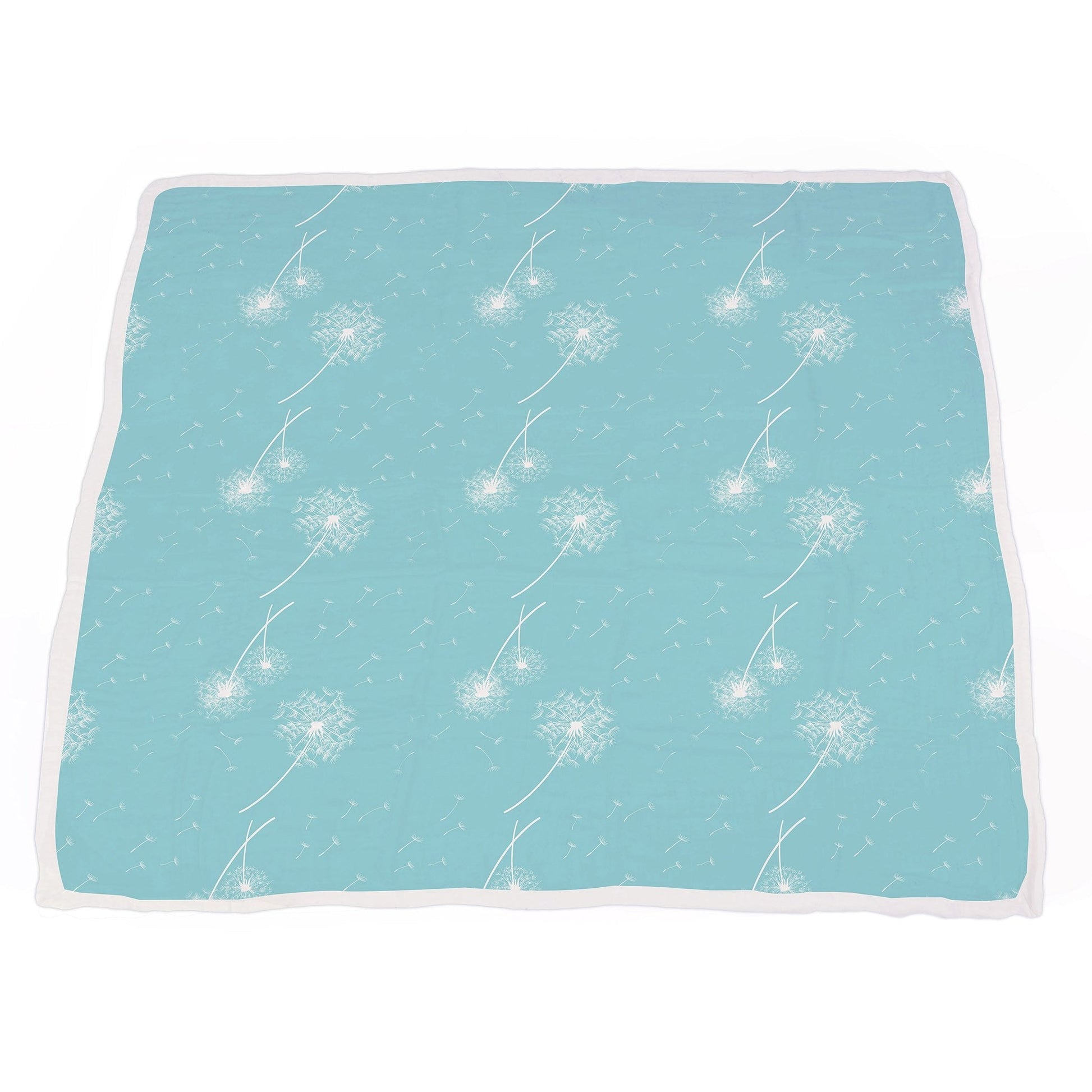 The multi-layer muslin blanket fully laid out to display the black and white Corgi dog print with an aqua blue corner fold.